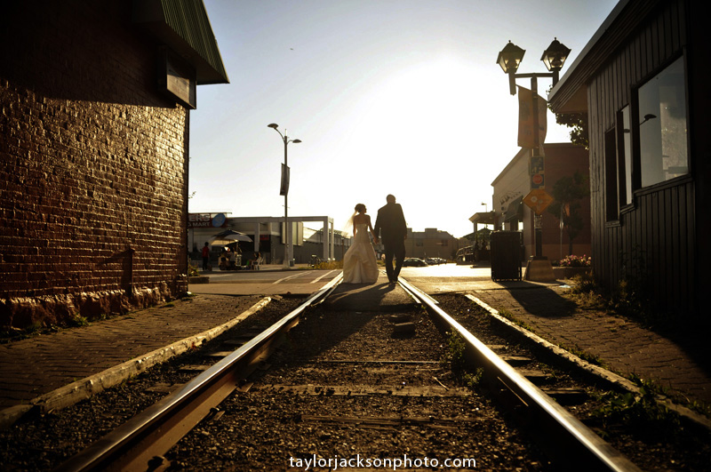 bridal couple photo train tracks crossing King St. in Waterloo